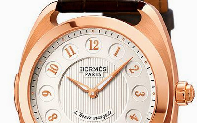 Hermes 18k rose gold Le Temps Suspendu watch dial