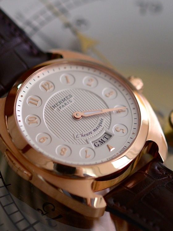 Side of Hermes 18k rose gold Le Temps Suspendu watch